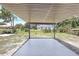 Covered patio with a concrete floor, perfect for outdoor entertaining and relaxation at 1118 Roberta Ave, Orlando, FL 32825