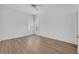 Bedroom with luxury vinyl floors, shutters, and white trim at 1158 Sweet Heather Ln, Apopka, FL 32712