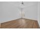 Bedroom featuring luxury vinyl floors, shutters, and a ceiling fan at 1158 Sweet Heather Ln, Apopka, FL 32712