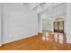 Spacious empty room with hardwood floors and grand front entrance with marble foyer at 1158 Sweet Heather Ln, Apopka, FL 32712