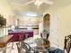 Open kitchen with a dining area, featuring ample cabinetry, and a functional layout for easy cooking at 118 Ventana Dr, Poinciana, FL 34759