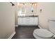 Bathroom featuring double sinks, granite countertops, and modern fixtures at 1201 Shelter Rock Rd, Orlando, FL 32835