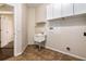 Laundry room featuring a utility sink and lots of storage at 1201 Shelter Rock Rd, Orlando, FL 32835