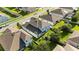 Spacious backyard featuring a well-maintained lawn and play area, perfect for outdoor activities and relaxation at 1265 Blarney St, Minneola, FL 34715