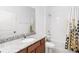 Bright bathroom featuring granite countertop and tiled shower with bathtub at 1265 Blarney St, Minneola, FL 34715