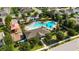 Aerial view of community pool, playground, and clubhouse; a great place to relax and play at 1265 Blarney St, Minneola, FL 34715