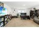 Spacious home office with large desk, guitars, and plenty of storage at 1265 Blarney St, Minneola, FL 34715