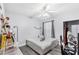 Cozy bedroom featuring a ceiling fan, modern flooring, and ample natural light at 1325 Lake Shadow Cir # 12303, Maitland, FL 32751