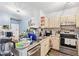 Well-lit kitchen with stainless steel appliances and ample cabinet space at 1325 Lake Shadow Cir # 12303, Maitland, FL 32751