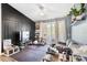 Inviting living room with modern decor and a sliding door to a balcony at 1325 Lake Shadow Cir # 12303, Maitland, FL 32751