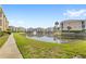 Beautiful pond with fountain feature surrounded by manicured lawns and condo buildings at 1325 Lake Shadow Cir # 12303, Maitland, FL 32751