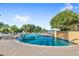 Large community pool with sun loungers, a waterfall feature, and lush landscaping at 1325 Lake Shadow Cir # 12303, Maitland, FL 32751