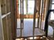 Framing of a new home showing exposed wood studs, plumbing, and electrical at 15465 Hamlin Park Drive, Winter Garden, FL 34787