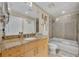 Bathroom featuring a granite countertop, tiled shower, and a soaking tub at 155 S Court Ave # 1909, Orlando, FL 32801