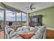 Spacious living room with floor-to-ceiling windows and amazing city views at 155 S Court Ave # 1909, Orlando, FL 32801