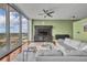 Inviting living room with comfortable seating, city view, and entertainment center at 155 S Court Ave # 1909, Orlando, FL 32801