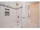 Elegant bathroom features a tiled shower with niche and sleek fixtures at 1748 Harvest Cv, Winter Park, FL 32792