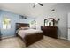 Spacious main bedroom with vaulted ceiling, fan, wood floors, and natural light at 1748 Harvest Cv, Winter Park, FL 32792