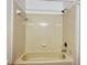 Cozy bathroom featuring a shower-over-tub combination with neutral tile surround and a shower head at 1825 Foxhall Cir # 1825, Kissimmee, FL 34741
