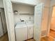 Convenient laundry room area with an open door with washer and dryer hookups at 1825 Foxhall Cir # 1825, Kissimmee, FL 34741