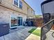 Backyard features putting green, fenced yard, grill, patio, and sliding glass doors for indoor outdoor living at 200 Saint Andrews Blvd # 3002, Winter Park, FL 32792