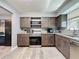 Modern kitchen with stainless steel appliances and granite countertops at 200 Saint Andrews Blvd # 3002, Winter Park, FL 32792