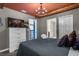 Themed bedroom with red ceiling, wooden beams and view into other rooms at 2927 Fable St, Kissimmee, FL 34746
