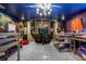 Themed bedroom featuring custom murals, gaming chairs, and bunk beds at 2927 Fable St, Kissimmee, FL 34746