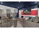 Fun game room with mounted flat-screen television, arcade machine, and plenty of space to play at 2927 Fable St, Kissimmee, FL 34746