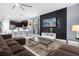 Spacious living room connects to modern kitchen, perfect for entertaining or relaxing in style at 2927 Fable St, Kissimmee, FL 34746