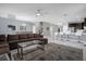 Expansive living space seamlessly integrates kitchen, dining, and living areas, perfect for modern living at 2927 Fable St, Kissimmee, FL 34746