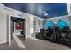 Theater room featuring reclining seating and Star Wars decor at 2927 Fable St, Kissimmee, FL 34746