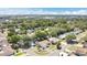 Wide aerial showing neighborhood, trees, and surrounding community amenities and convenient location at 3217 Castle Oak Ave, Orlando, FL 32808
