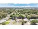 Neighborhood aerial view showcasing the home's location, surrounding trees, and proximity to neighborhood at 3217 Castle Oak Ave, Orlando, FL 32808