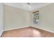 This bedroom features light paint, ceiling fan and hardwood flooring at 3217 Castle Oak Ave, Orlando, FL 32808