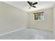 Bedroom with ceiling fan, a window, and neutral paint at 3217 Castle Oak Ave, Orlando, FL 32808