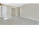 Spacious living room featuring ceramic tile floors and neutral color palette at 3217 Castle Oak Ave, Orlando, FL 32808