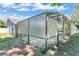 Side view of a large pool enclosure at 3217 Castle Oak Ave, Orlando, FL 32808