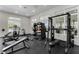 Fitness center with free weights, medicine balls, and various exercise machines at 3334 Arch Ave, Ormond Beach, FL 32174