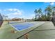 Community pickleball courts featuring well-maintained surfaces and fencing for recreational play at 3334 Arch Ave, Ormond Beach, FL 32174