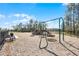 Community playground featuring a swing set and modern play equipment within a safe and well-maintained area at 3334 Arch Ave, Ormond Beach, FL 32174