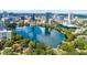 Scenic aerial view of downtown skyline, sparkling lake, and lush green trees create a vibrant cityscape at 338 E Anderson St, Orlando, FL 32801