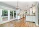 Bright, open kitchen featuring granite countertops, stainless steel appliances, and access to the backyard at 338 E Anderson St, Orlando, FL 32801
