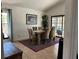 Dining room with ample natural light, a dining table with seating, and modern decor at 340 Haversham Way, Davenport, FL 33897