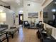 Inviting living room featuring tile flooring, neutral walls, and comfortable seating arrangements at 340 Haversham Way, Davenport, FL 33897