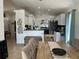 Spacious open-concept layout with dining area seamlessly connected to the kitchen, ideal for Gathering gatherings at 340 Haversham Way, Davenport, FL 33897