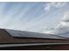 New solar panels installed on roof providing energy efficiency and modern appeal at 340 Haversham Way, Davenport, FL 33897