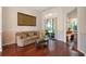 Comfortable living room area with sliding glass doors to an outdoor living space at 3696 Peacepipe Ct, Clermont, FL 34711