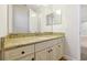 Bathroom vanity featuring granite countertops and ample cabinet space at 3844 Bowfin Trl, Kissimmee, FL 34746