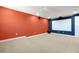 Vibrant bonus room/home theater featuring carpet, projector, and screen, perfect for entertainment at 3844 Bowfin Trl, Kissimmee, FL 34746